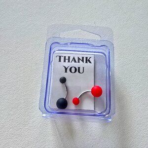 Two double acrylic ball belly button rings red and black